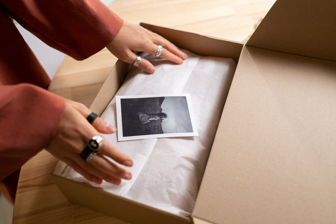 Woman opening curated gift box