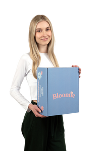 Woman holding a Bloomie Box