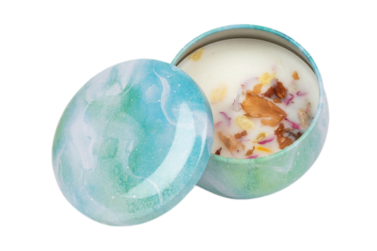 Blue decorative candle tin that includes dried flowers in the soy wax