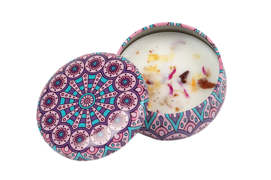 Purple decorative candle tin that includes dried flowers in the soy wax